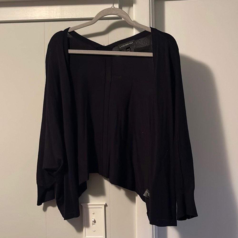 3x black light sweater.